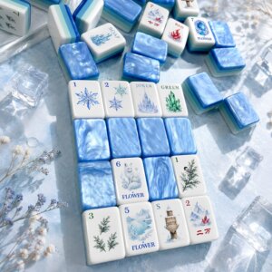 Ice Crystal winter American Mahjong tiles with snowflake and mountain artwork