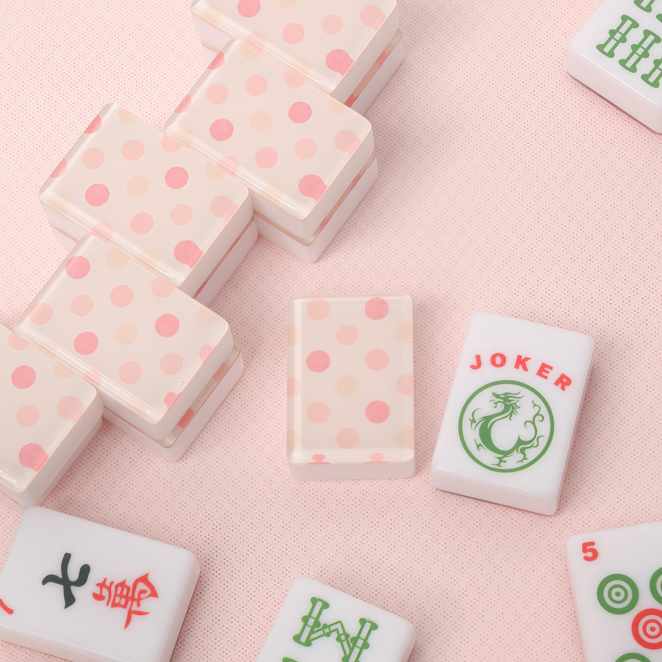 Peach pink polka-dot American Mahjong tiles with dotted backs