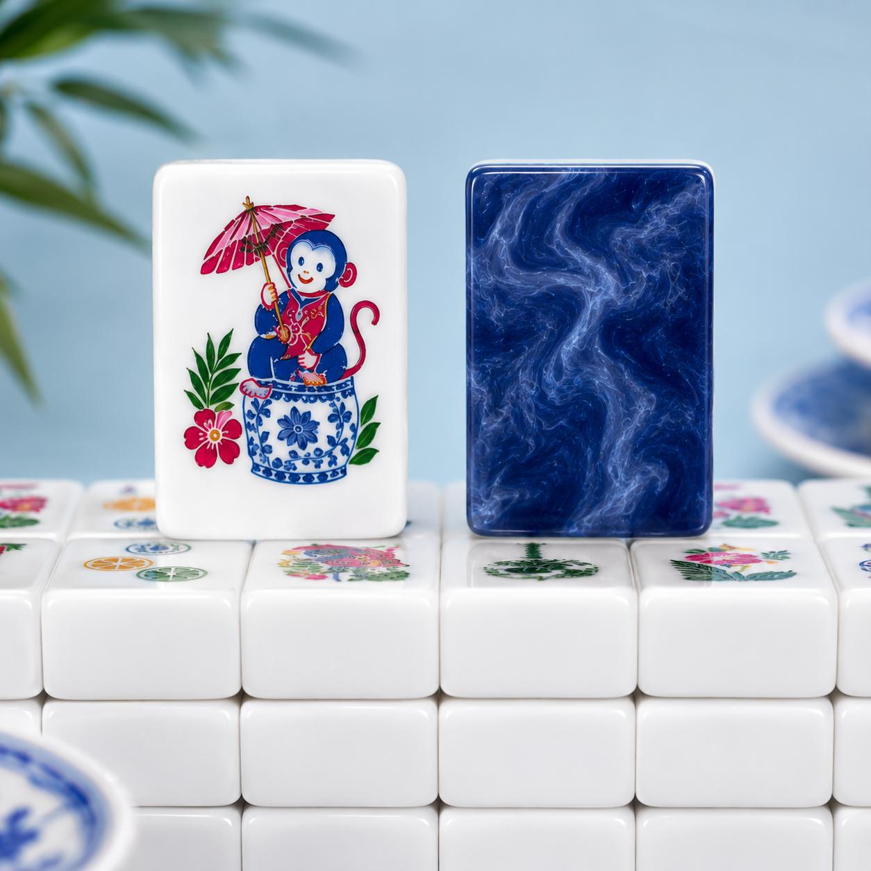 Parasol Monkey Blue Marble American Mahjong Tiles with colorful monkey and navy swirl back