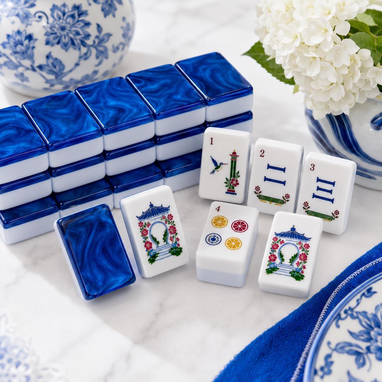 Blue Marble Garden American Mahjong Tiles with sapphire swirl backs and flower garden faces